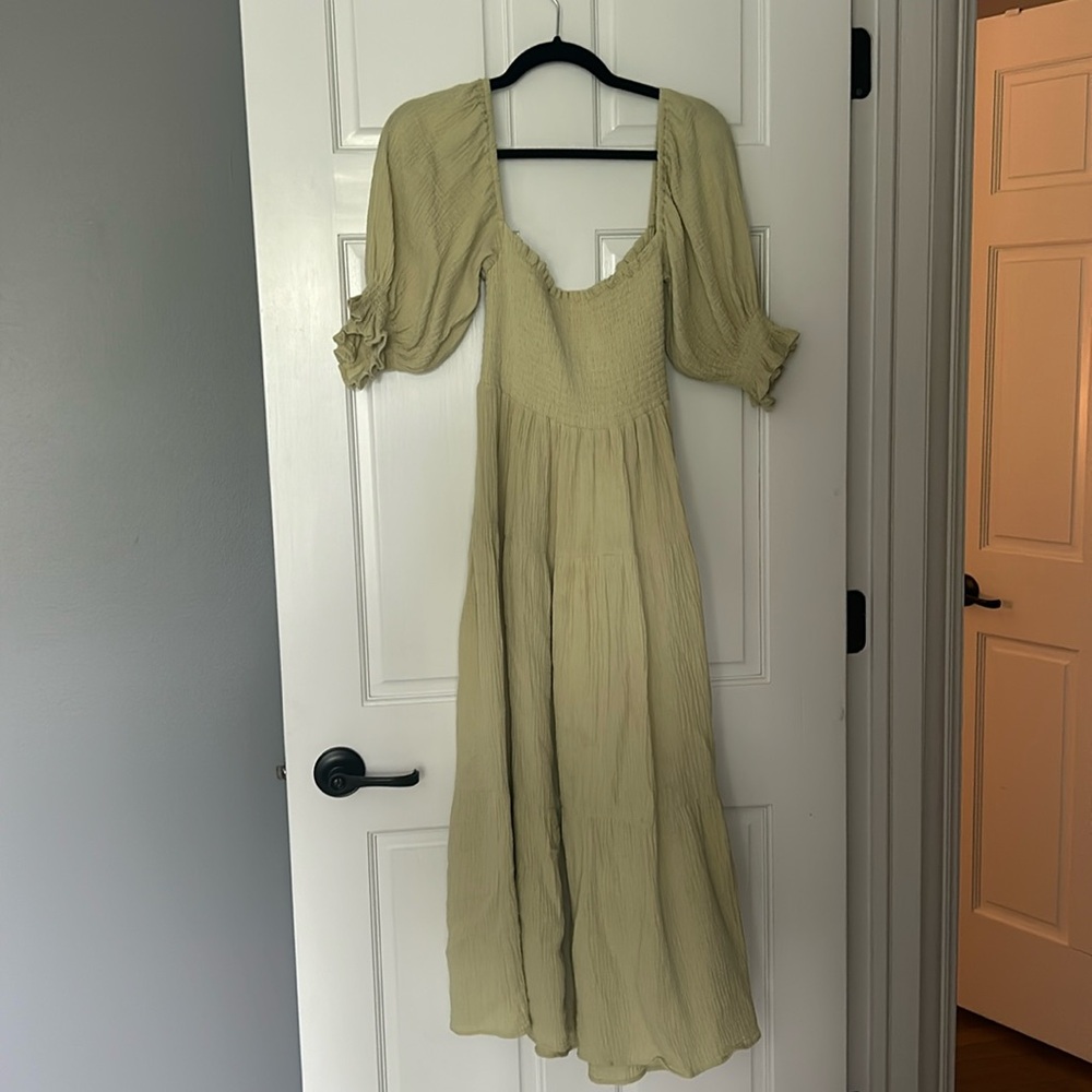 Light green, short sleeve, smock dress from Few Moda. Brand is OPT, medium